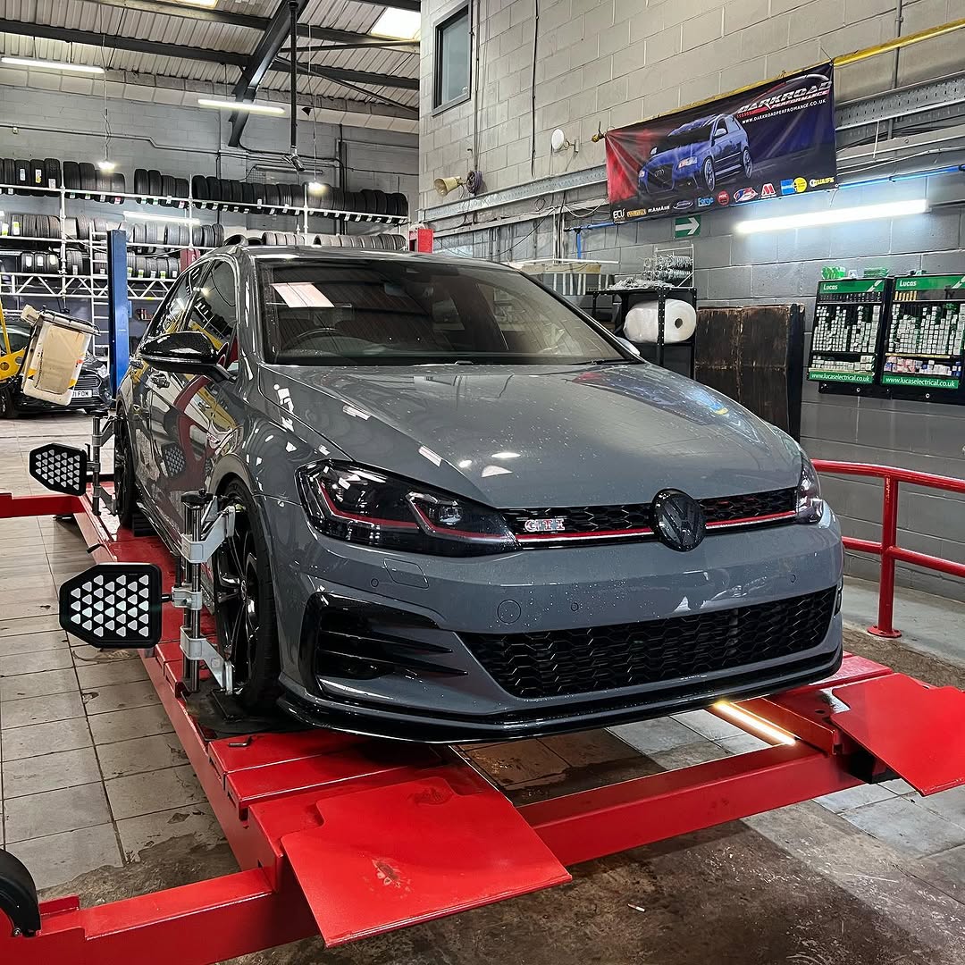 A car being worked on in the White Rose Motors workshop